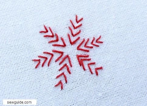 arrowhead stitches made in the shape of a flower