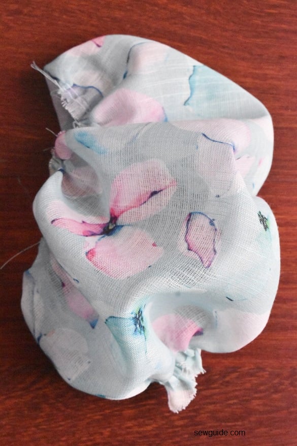 fabric gathered to balloon shaped sleeve
