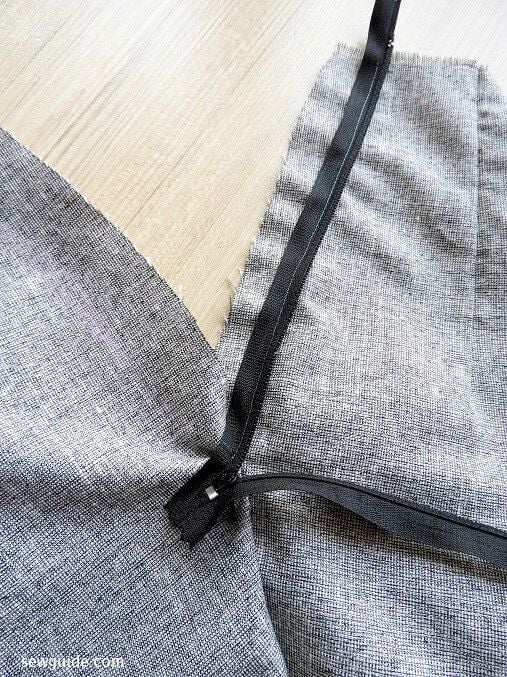 Keep the zipper face down