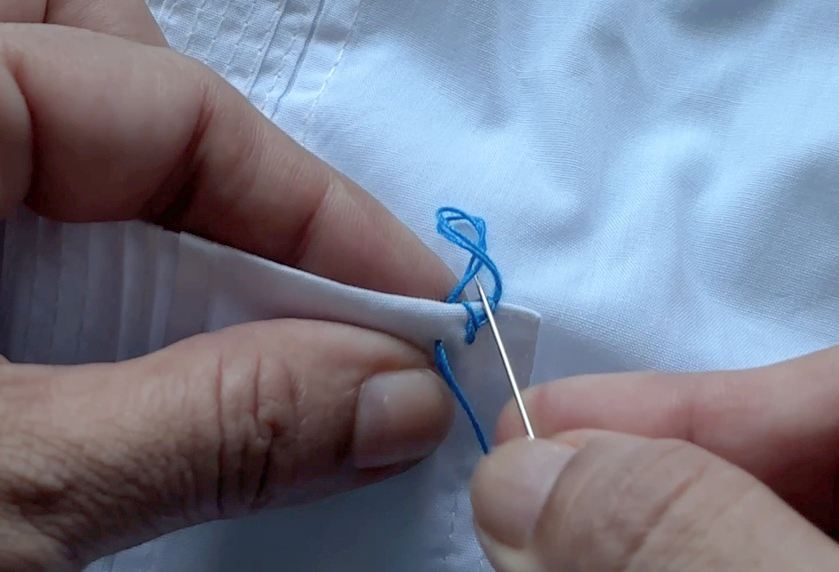 insert needle through the hoop