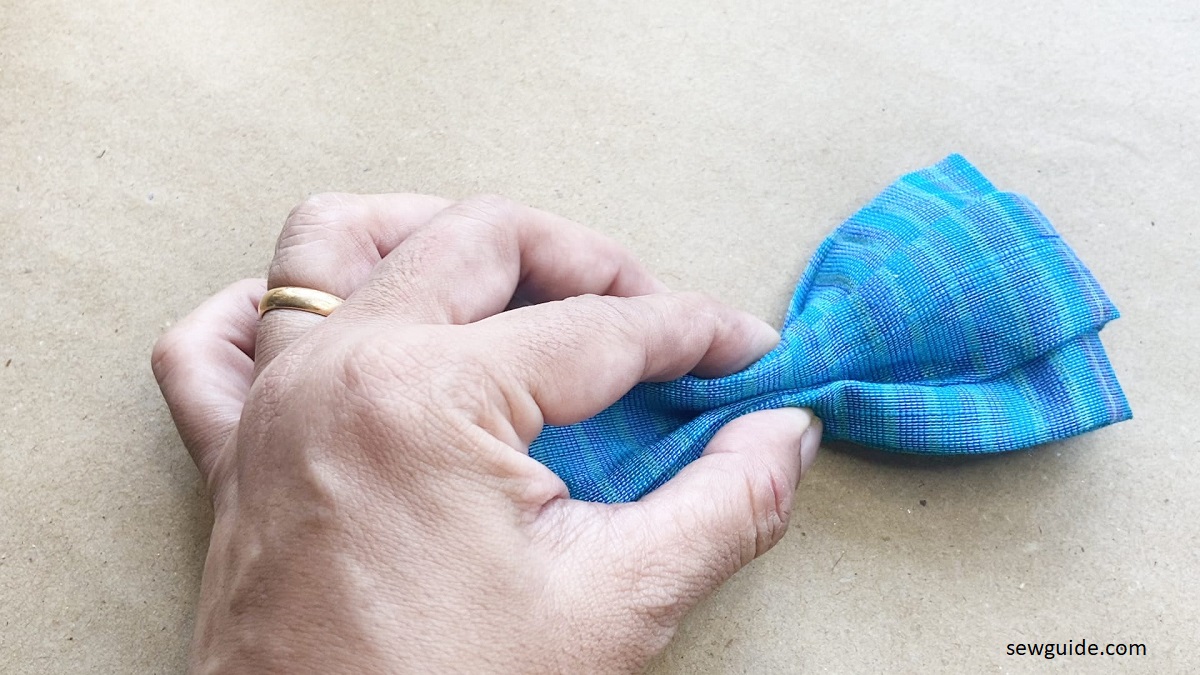 pinch the bow fabric by the middle