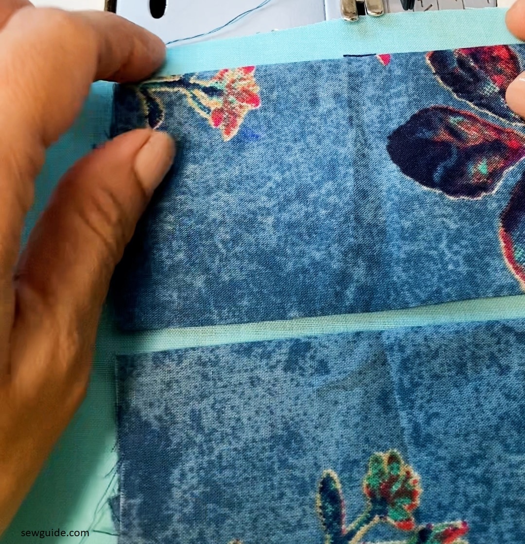 stitch it to the middle of the sleeve