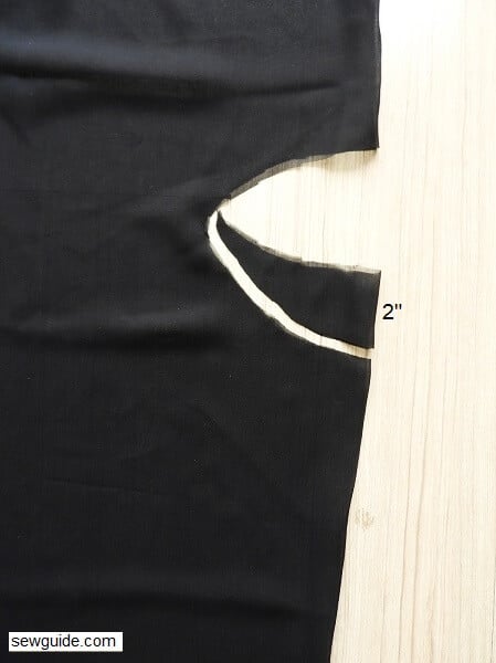 The front neckline is cut with more depth