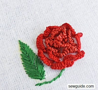 rose made with cast on stitches for 3 d embroidery
