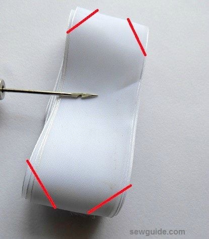 christmas bow tie - cut the ends as in the picture - cut off beyond the red lines