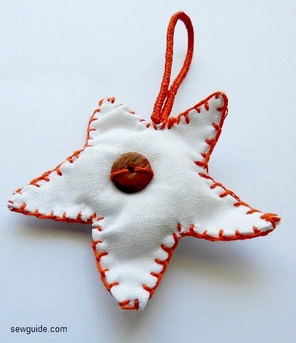 star shaped christmas ornament made with fabric