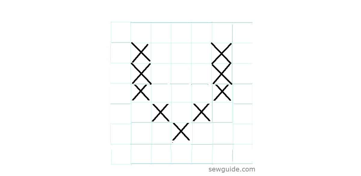 Cross stitch letter V