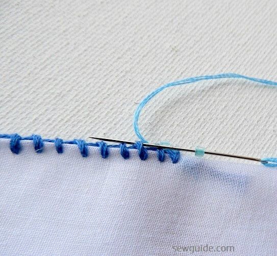 beads are added after the blanket stitch edge is made