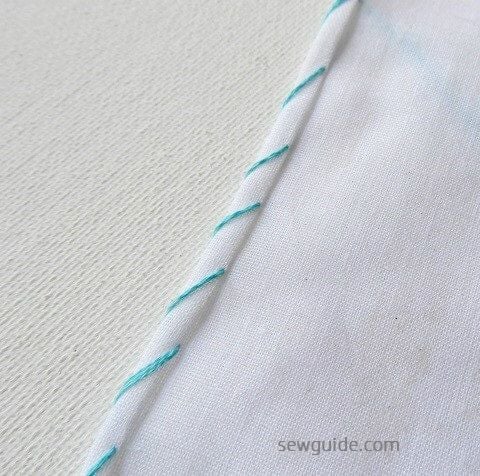 decorative hand sewing edges -make slanting stitches along the folded edge