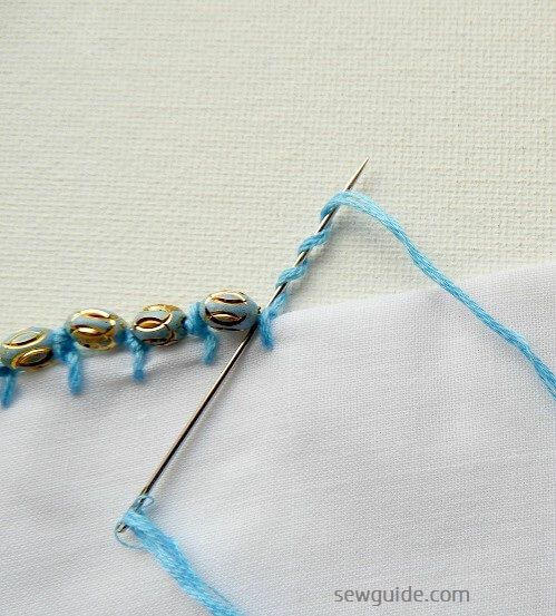 Twist thread around the needle