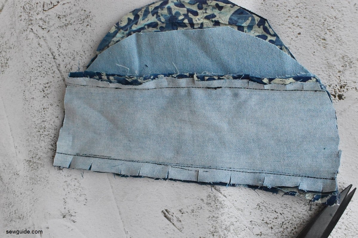 clip the edges of the denim to fray