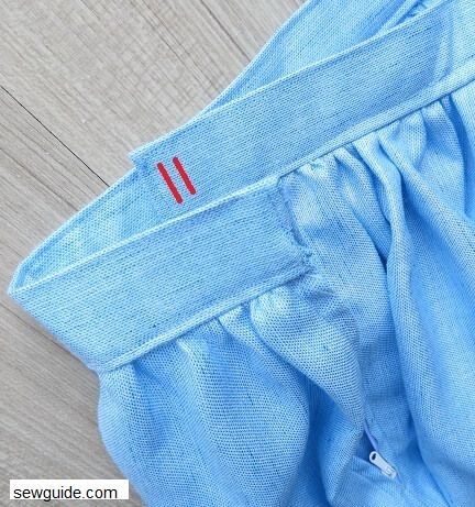 Mark fastener on the skirt waistband and attach