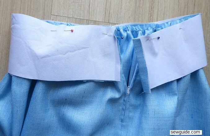Pin the waistband to the skirt