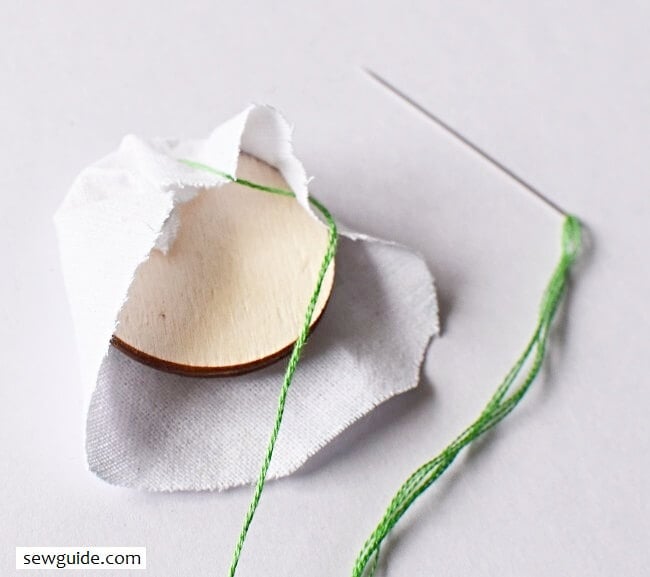 gathering stitches made to gather the fabric edges at the back..