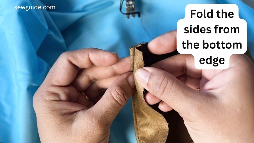 fold the bottom edge of the pocket