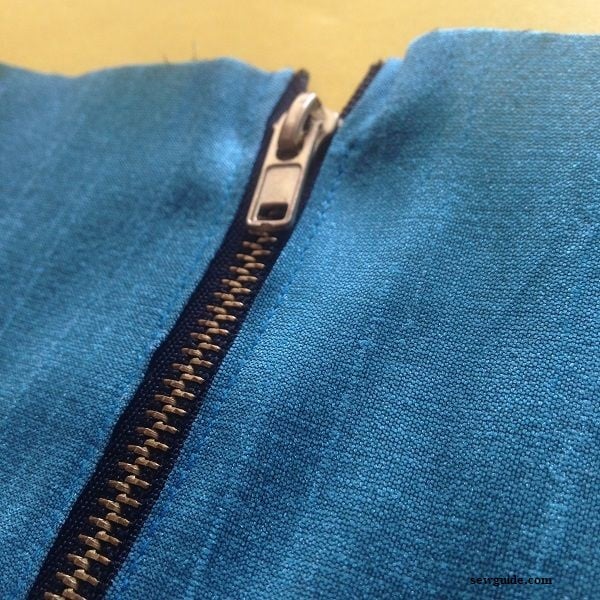 Top stitch the zipper in place