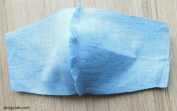 Sandwich the elastic between the outer and lining