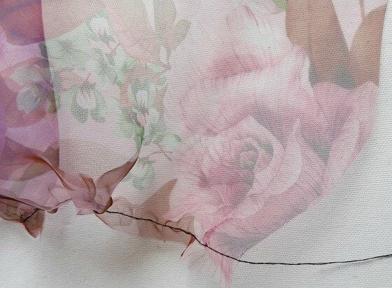 gather the edges of the fabric with gathering stitches