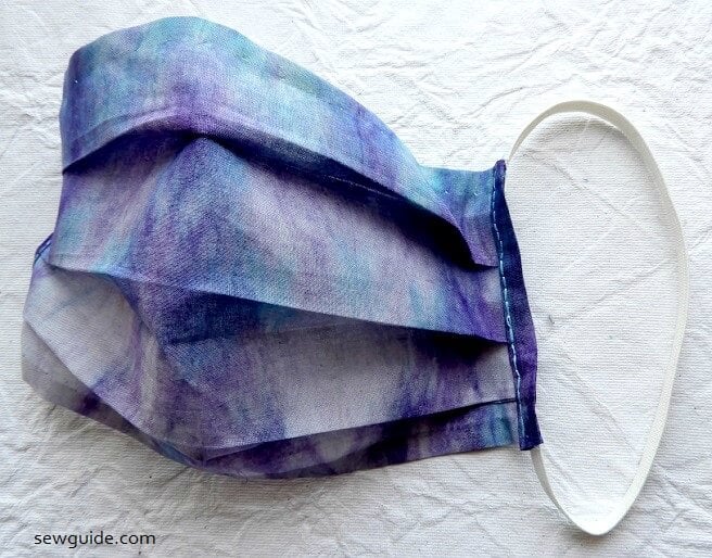 hand sewing a mask