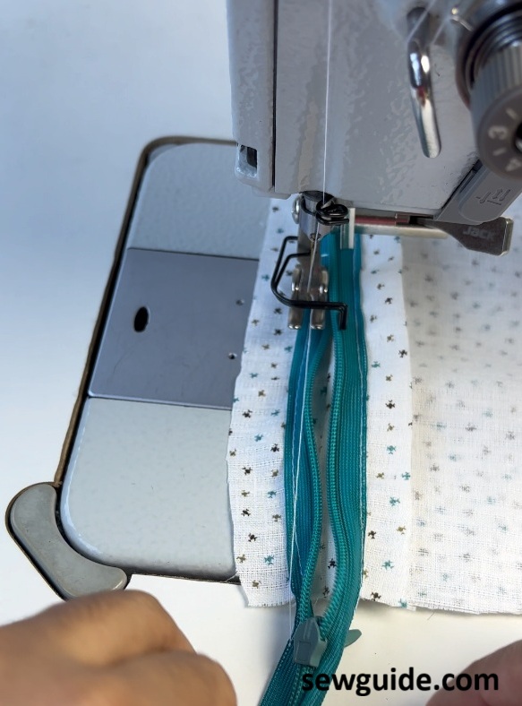 other side of invisible zipper sewn to the seam allowance