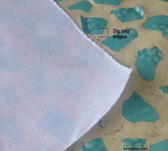 zig zag edge on a embroidered handkerchief