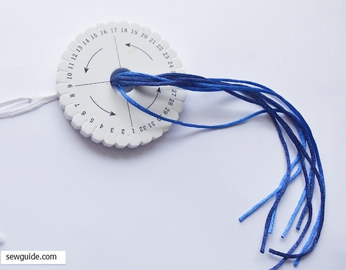 kumihimo braid DIY - insert the middle through the hole