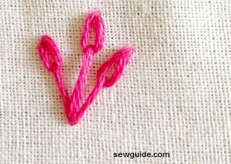 This is a lazy daisy stitch with a long straight stitch as its stem -lazy daisy flower embroidery designs