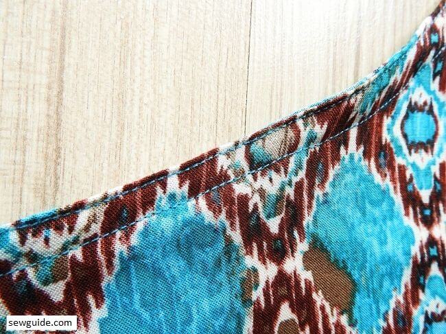 neatly stitch the binding in place