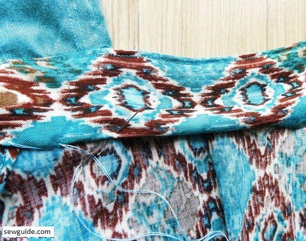 on the back sew the facing in place