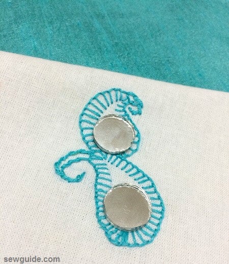 mango / paisley design -with blanket stitches