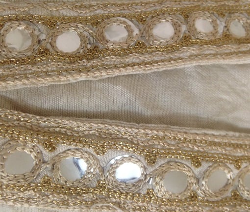 machine stitches made over plastic mirror