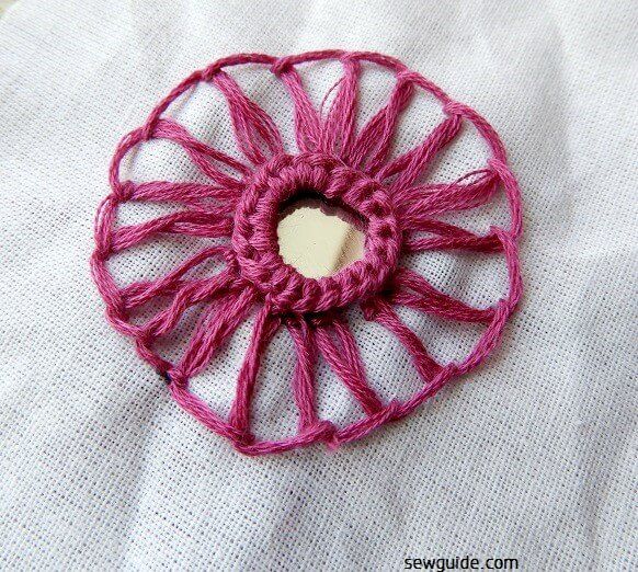 Make basque stitch arounf the mirror