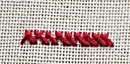 Plait stitch in needle point stitch embroidery