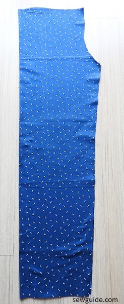 the folded fabric cut in the pattern for sewing pajama pants