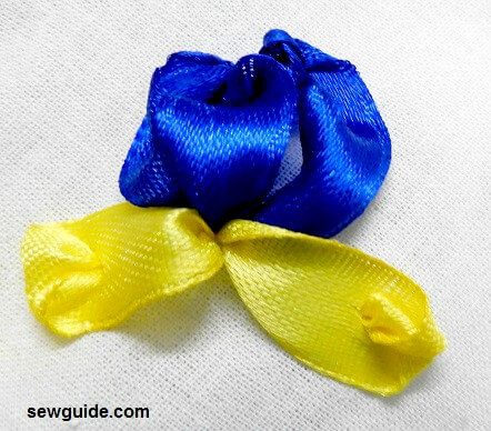 Fill the pansy design with ribbon embroidery