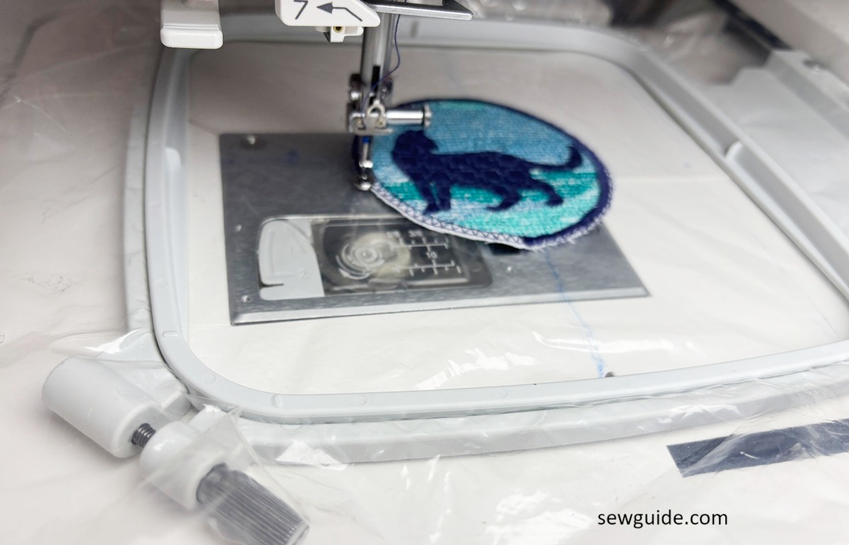 The outline stitching around the patch