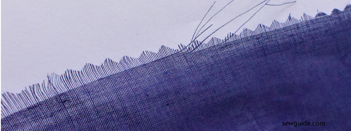 pinking scissor used on a thin fabric with loose weave