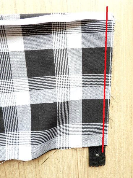 Sew the elastic to the yoke of the pleated skirt