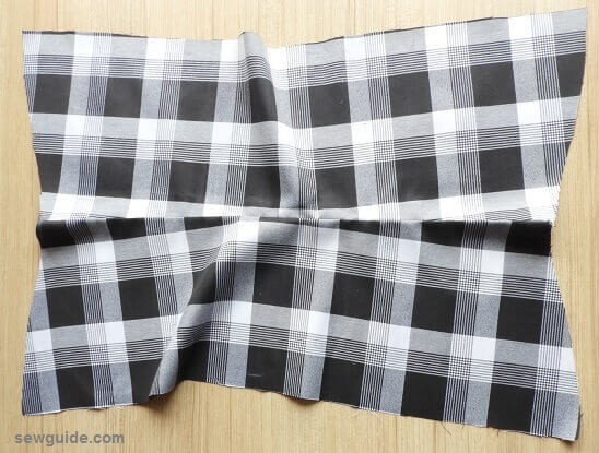 front yoke piece and the lining fabric  stitched- pleated skirt