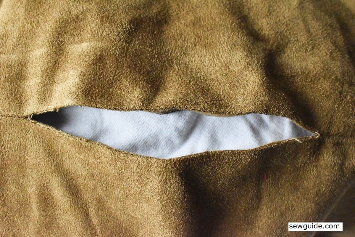 Rip on a seam which cannot be accessed from the back.