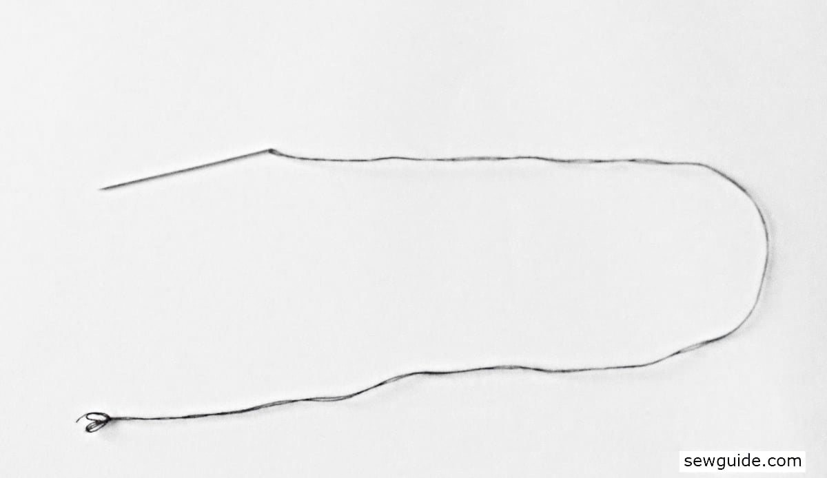 thread a hand sewing needle with matching thread for sewing the seam back.