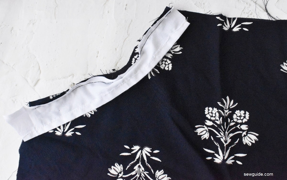 sew binding strips at the armhole