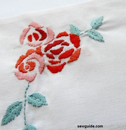satin stitched petals of the embroidered rose