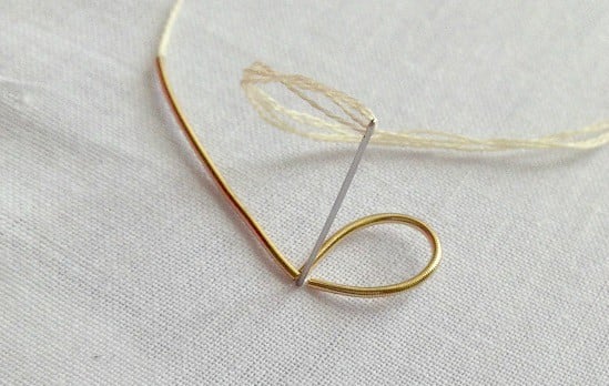 embroidery roses made with metallic embroidery stitches