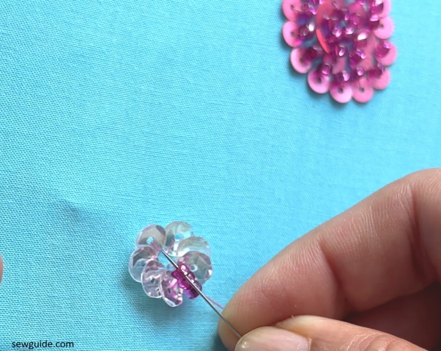 stitch beads inside sequins flower