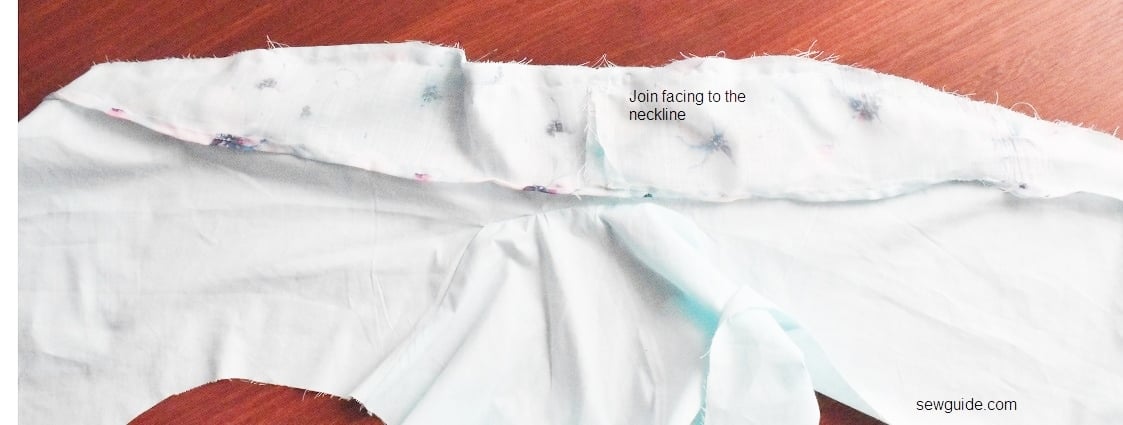 join the collar facing to the edge of the bodice