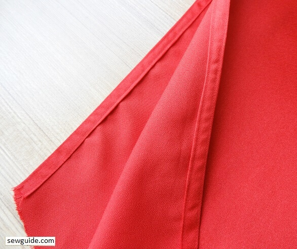 Finish the top edge of back and front