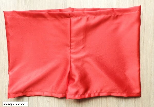 Bring the top edge down - make a casing at the top