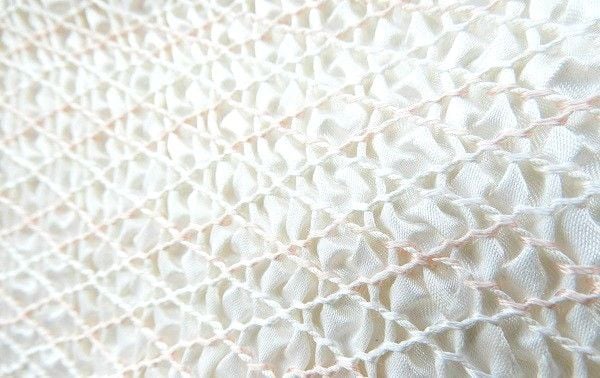 wave stitches used as smocking stitches in a frock