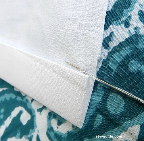 take one single thread from the fabric to make the almost invisible split stitch